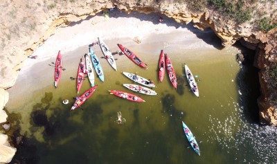 Bird's eye view of a fleet of Neris Smart PRO kayaks nestled in a bag